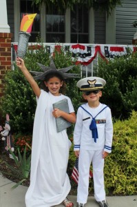 boy and girl statues